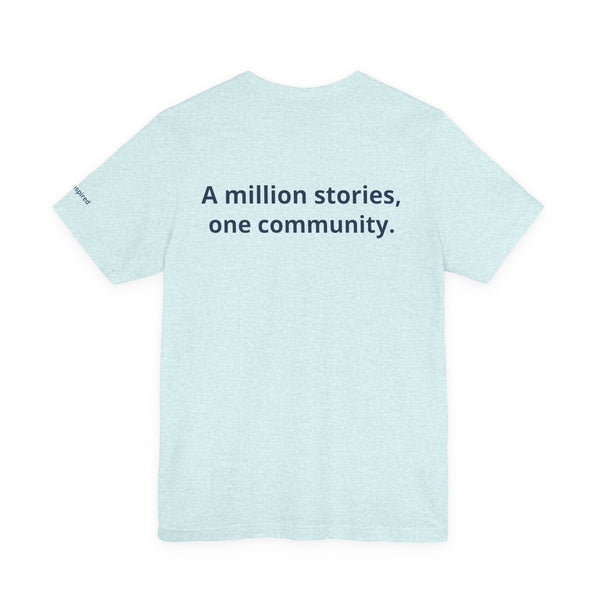 InspireThread Signature Tee – A Million Stories, One Community (Unisex)